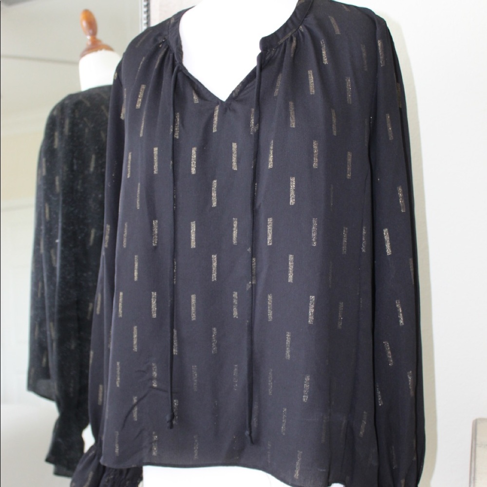 black long sleeve with great detail and gold